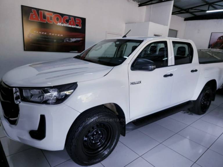 TOYOTA - HILUX - 2021/2021 - Branca - R$ 160.900,00